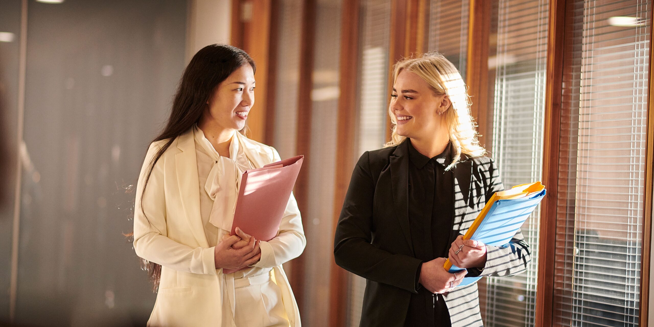 Australian Lawyers in conversation walking through office